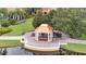 Community gazebo with copper roof over water at 11886 Nautica Dr, Orlando, FL 32827