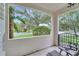 Covered porch with seating and view of neighborhood at 11886 Nautica Dr, Orlando, FL 32827