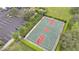 Community basketball court with two hoops and parking at 11886 Nautica Dr, Orlando, FL 32827