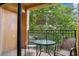 Private balcony with table and chairs at 12527 Floridays Resort Dr # 312-E, Orlando, FL 32821