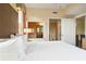 Main bedroom with king bed, ensuite bathroom access, and natural light at 12527 Floridays Resort Dr # 312-E, Orlando, FL 32821