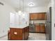 Kitchen with island and stainless steel appliances at 12527 Floridays Resort Dr # 312-E, Orlando, FL 32821