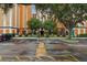 Condo building exterior with parking and building entrance at 12527 Floridays Resort Dr # 312-E, Orlando, FL 32821