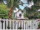Quaint cottage exterior with a heart fence at 1079 Marion St, Lake Helen, FL 32744