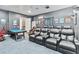 Game room with theater seating and pool table at 1257 Radiant St, Reunion, FL 34747