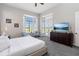 Bright Primary bedroom with private access to patio and ample natural light at 1257 Radiant St, Reunion, FL 34747