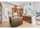 Gourmet kitchen boasts granite countertops, ample cabinetry, and stainless steel appliances at 1257 Radiant St, Reunion, FL 34747