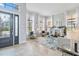 Spacious living room with fireplace and large windows at 1257 Radiant St, Reunion, FL 34747