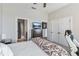 Comfortable bedroom with a king bed, ensuite bathroom, and ample closet space at 1257 Radiant St, Reunion, FL 34747