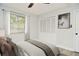 Bedroom with large closet and ceiling fan at 213 E Hillcrest St, Altamonte Springs, FL 32701