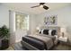 Bedroom with large closet and ceiling fan at 213 E Hillcrest St, Altamonte Springs, FL 32701