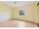 Bright bedroom with hardwood floors and a window with a view at 12151 Walker Pond Rd, Winter Garden, FL 34787