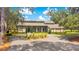 Two-story house with circular driveway at 12151 Walker Pond Rd, Winter Garden, FL 34787