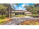 Two-story house with circular driveway at 12151 Walker Pond Rd, Winter Garden, FL 34787