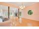 Bright dining room with hardwood floors and a stained-glass window at 12151 Walker Pond Rd, Winter Garden, FL 34787