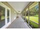 Screened porch with access to the backyard at 12151 Walker Pond Rd, Winter Garden, FL 34787