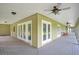 Expansive screened porch with multiple access points at 12151 Walker Pond Rd, Winter Garden, FL 34787