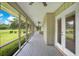 Long screened porch overlooking the backyard at 12151 Walker Pond Rd, Winter Garden, FL 34787