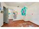 This bedroom includes wood flooring and painted walls at 3034 Touraine Ave, Orlando, FL 32812