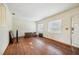 Living room with wood floors and large windows at 3034 Touraine Ave, Orlando, FL 32812