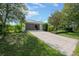 Detached garage with a long driveway at 2620 Osceola Bluff Ln, Geneva, FL 32732