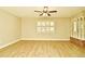 Living room with light floors and ceiling fan at 1781 Carlton St, Longwood, FL 32750