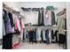 Large walk-in closet with ample shelving and hanging space at 7410 Barrier Cove Way, Kissimmee, FL 34747