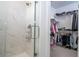 Bathroom with shower and spacious walk-in closet at 7410 Barrier Cove Way, Kissimmee, FL 34747