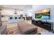 Open concept living room with kitchen view at 7410 Barrier Cove Way, Kissimmee, FL 34747