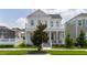 Two-story house with white columns and balcony at 7410 Barrier Cove Way, Kissimmee, FL 34747