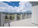 Private balcony overlooking a residential neighborhood at 7410 Barrier Cove Way, Kissimmee, FL 34747