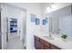 Bathroom with a tub, toilet, sink, and vanity at 4498 Monado Dr, Kissimmee, FL 34746