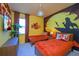 The Lion King themed bedroom with twin beds at 4498 Monado Dr, Kissimmee, FL 34746