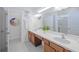 Bathroom with a double vanity and an updated look at 4498 Monado Dr, Kissimmee, FL 34746