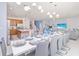 Elegant dining room with large table and seating for ten, ideal for entertaining at 4498 Monado Dr, Kissimmee, FL 34746