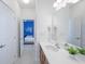 Bathroom with vanity and access to bedroom at 4498 Monado Dr, Kissimmee, FL 34746
