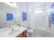 Clean bathroom with a tub, toilet, sink, and vanity at 4498 Monado Dr, Kissimmee, FL 34746