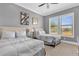 Spacious bedroom with two twin beds and large windows at 837 Desert Mountain Ct, Reunion, FL 34747