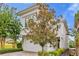 Modern home with stone accents and two-car garage at 837 Desert Mountain Ct, Reunion, FL 34747