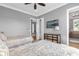 Bedroom with two twin beds and a dresser at 837 Desert Mountain Ct, Reunion, FL 34747