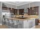Modern kitchen featuring stainless steel appliances and granite countertops at 837 Desert Mountain Ct, Reunion, FL 34747