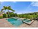 Inviting pool and spa with tranquil golf course views at 837 Desert Mountain Ct, Reunion, FL 34747