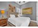 Bedroom with a king-size bed and neutral color palette at 837 Desert Mountain Ct, Reunion, FL 34747
