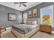 Spacious bedroom with a king-size bed and neutral decor at 837 Desert Mountain Ct, Reunion, FL 34747