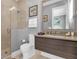 Bathroom with shower and modern vanity at 837 Desert Mountain Ct, Reunion, FL 34747