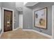 Spacious entryway with large artwork and tile flooring at 837 Desert Mountain Ct, Reunion, FL 34747