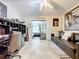 Home office with built-in shelving, desk, and access to a sunroom at 100 E Oak Terrace Dr # G1, Leesburg, FL 34748