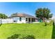 Large backyard with green grass and playset at 4901 Culdesac Ct, St Cloud, FL 34772