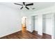 Bedroom with wood flooring and double closets at 4901 Culdesac Ct, St Cloud, FL 34772
