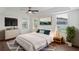 Main bedroom with wood floors and neutral decor at 4901 Culdesac Ct, St Cloud, FL 34772